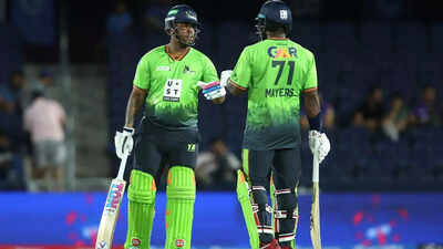 Hetmyer congratulated after reaching fifty
