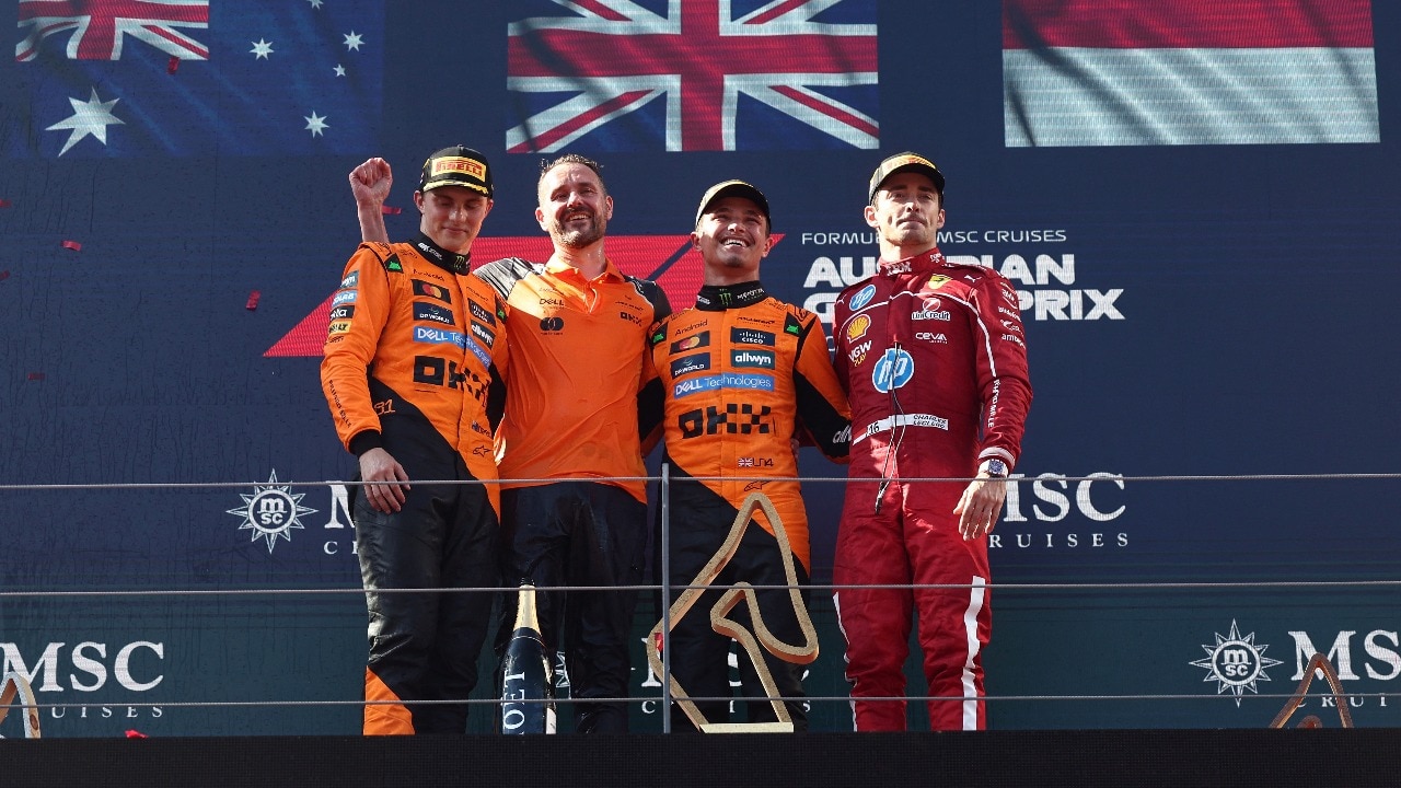 McLaren celebrates their impressive 1-2 finish with Ferrari's Leclerc in third.